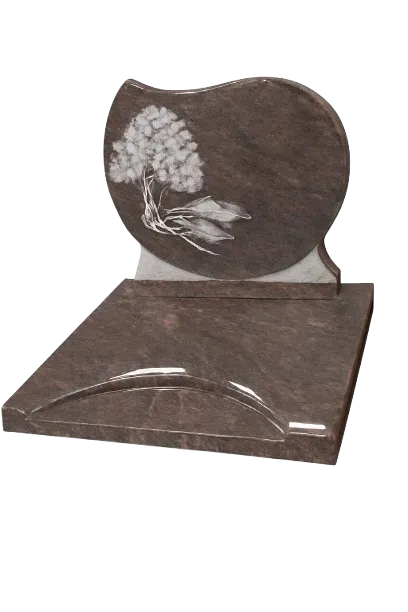 Petit monument cinéraire en granite foncé gravé d'un motif végétal sur stèle arrondie.